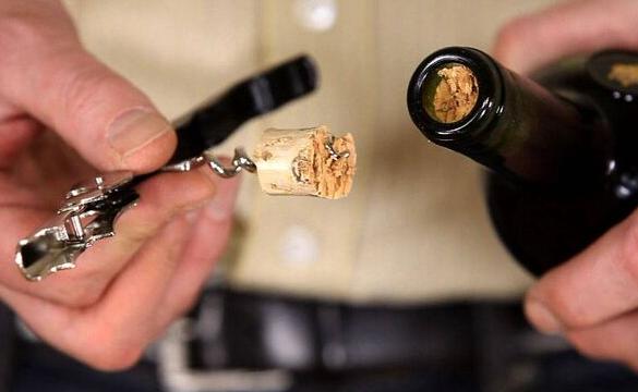 How to get broken cork out of wine bottle